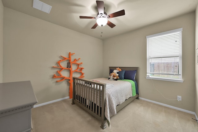 7610 Willow School Dr, Spring, TX 77389 - carpeted bedroom featuring baseboards, visible vents, and ceiling fan