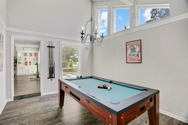 playroom featuring billiards, dark wood finished floors, baseboards, a notable chandelier, and a high ceiling