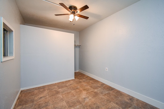 7218 Tours St, Houston, TX 77036 - empty room with ceiling fan and baseboards