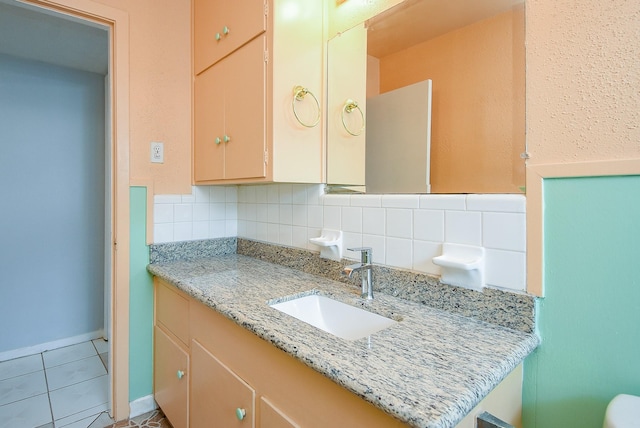 7218 Tours St, Houston, TX 77036 - half bathroom featuring tasteful backsplash, vanity, tile patterned flooring, and toilet