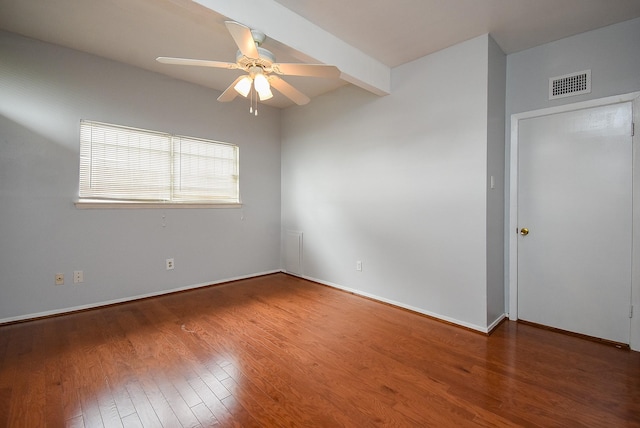 7218 Tours St, Houston, TX 77036 - unfurnished room featuring ceiling fan, wood finished floors, baseboards, and beam ceiling
