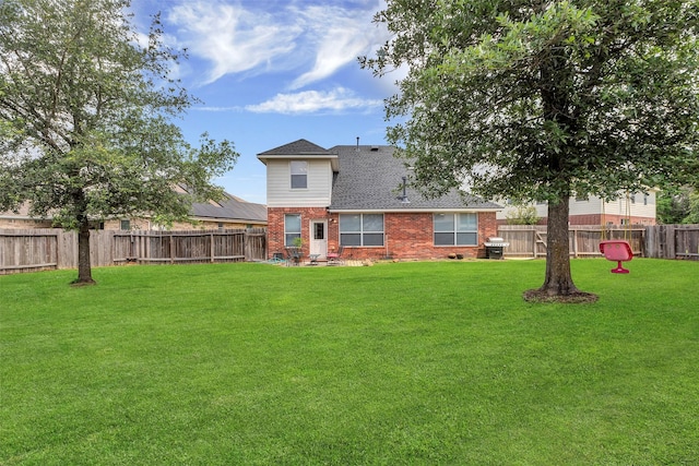 view of yard featuring a fenced backyard
