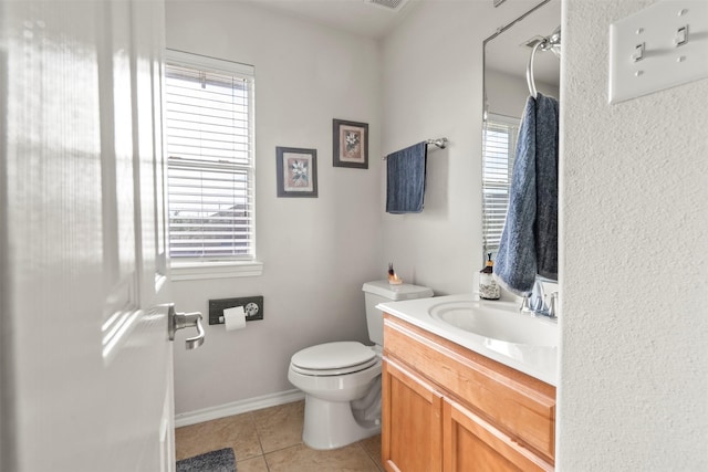 31611 Cape May Ct, Spring, TX 77386 - bathroom with tile patterned flooring, toilet, vanity, and baseboards