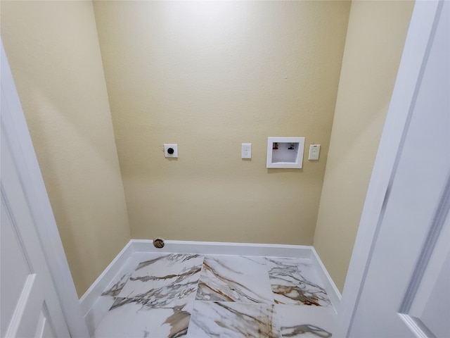 laundry area with laundry area, hookup for a washing machine, marble finish floor, baseboards, and electric dryer hookup