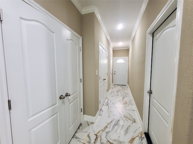 corridor featuring baseboards, ornamental molding, recessed lighting, and marble finish floor