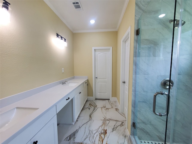 full bath with visible vents, ornamental molding, a marble finish shower, and a sink