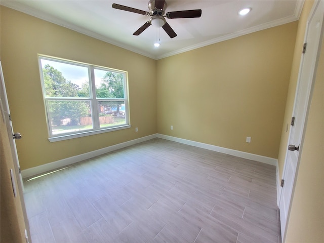 spare room with crown molding, baseboards, a ceiling fan, and recessed lighting