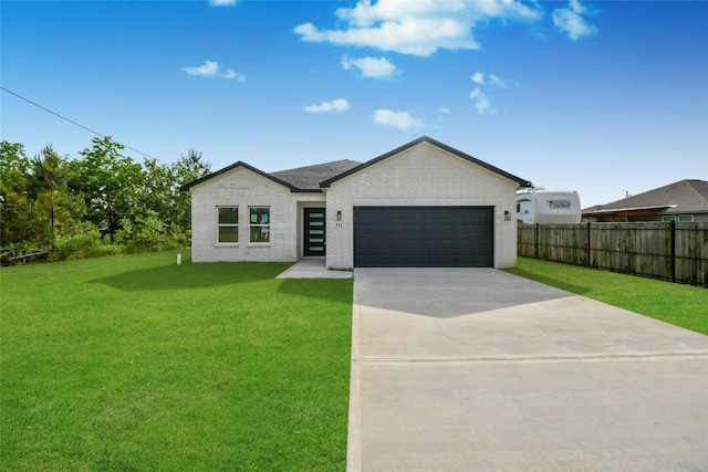 600 Rd 5105, Cleveland, TX 77327 - ranch-style house with brick siding, fence, and a front yard