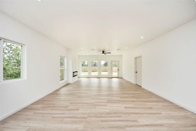 600 Rd 5105, Cleveland, TX 77327 - unfurnished room featuring recessed lighting, baseboards, ceiling fan, and light wood finished floors