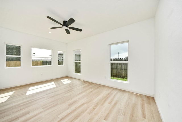 600 Rd 5105, Cleveland, TX 77327 - unfurnished room featuring baseboards, ceiling fan, and wood finished floors