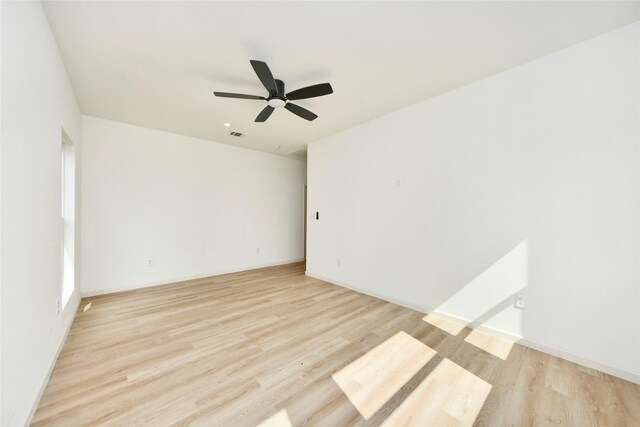 600 Rd 5105, Cleveland, TX 77327 - spare room featuring ceiling fan and light wood finished floors