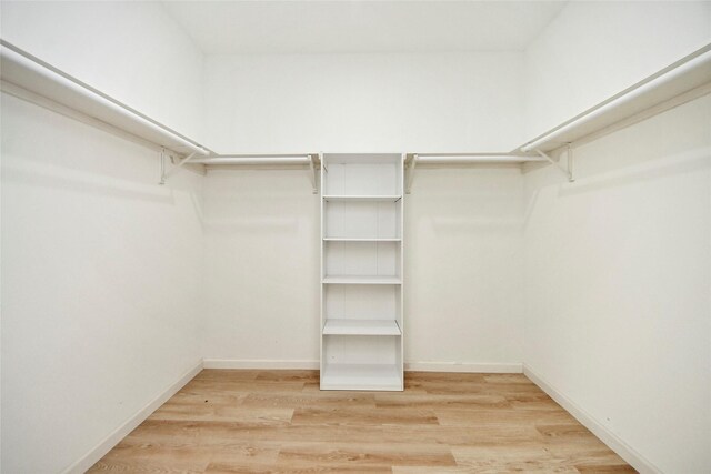 600 Rd 5105, Cleveland, TX 77327 - walk in closet with wood finished floors