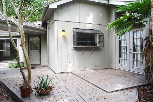 doorway to property with french doors and a wooden deck
