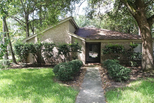 view of front of home with brick siding