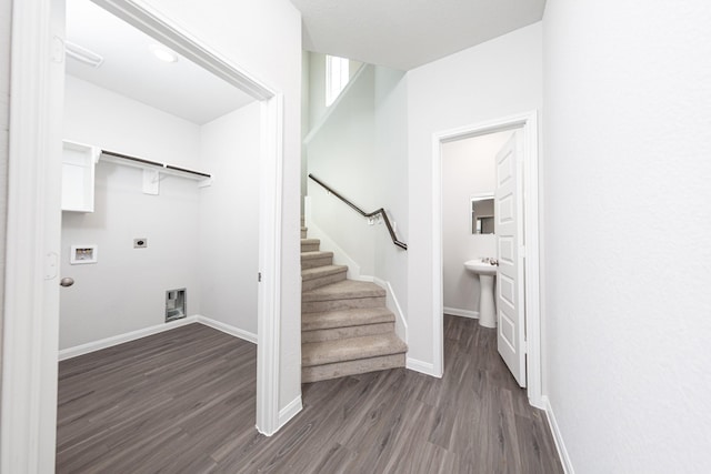 laundry room with hookup for an electric dryer, laundry area, baseboards, dark wood-style floors, and hookup for a washing machine
