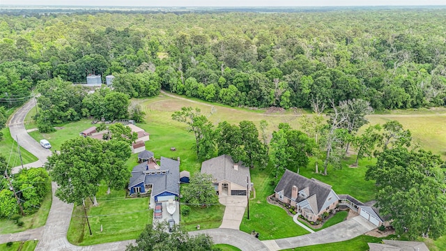 bird's eye view featuring a forest view