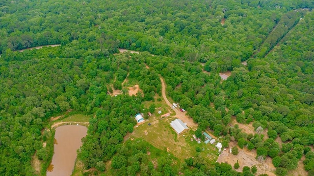 bird's eye view featuring a forest view