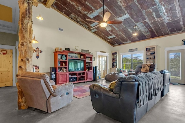 living area with visible vents, a ceiling fan, finished concrete floors, and high vaulted ceiling