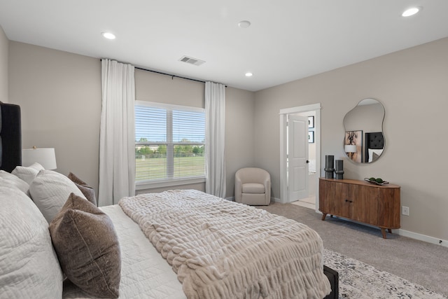 bedroom featuring visible vents, recessed lighting, baseboards, and light colored carpet