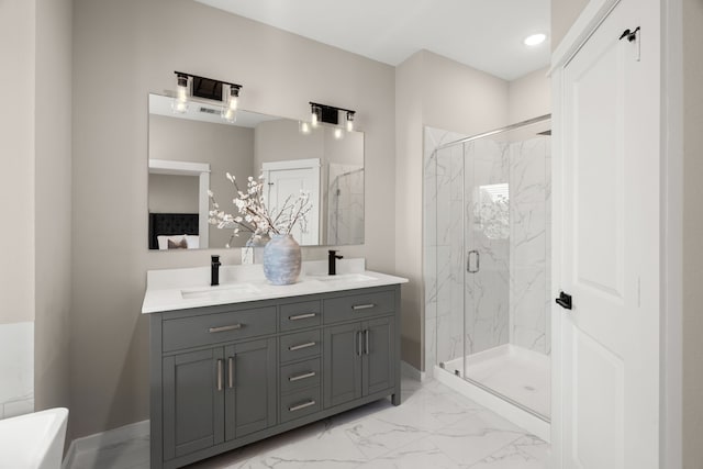 bathroom with a sink, a marble finish shower, and marble finish floor