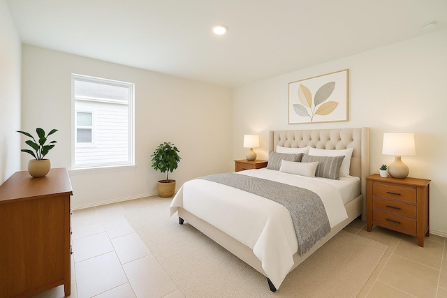 bedroom with baseboards, recessed lighting, and light tile patterned floors