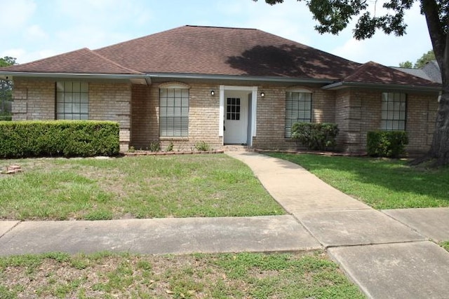 9222 Chesney Downs Dr, Houston, TX 77083 - ranch-style house with a front lawn, roof with shingles, and brick siding