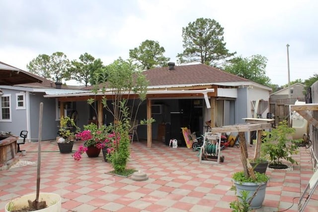 9222 Chesney Downs Dr, Houston, TX 77083 - rear view of house featuring a patio area and stucco siding