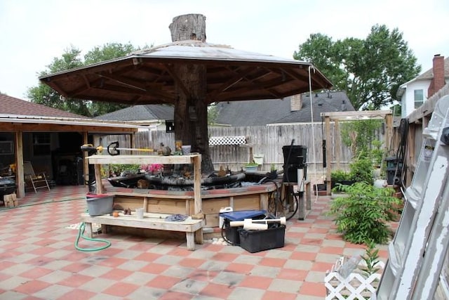 9222 Chesney Downs Dr, Houston, TX 77083 - view of patio featuring a gazebo