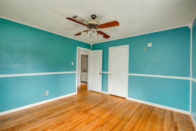 1622 Jennifer Ln, Houston, TX 77029 - unfurnished bedroom featuring baseboards, ornamental molding, and hardwood / wood-style floors