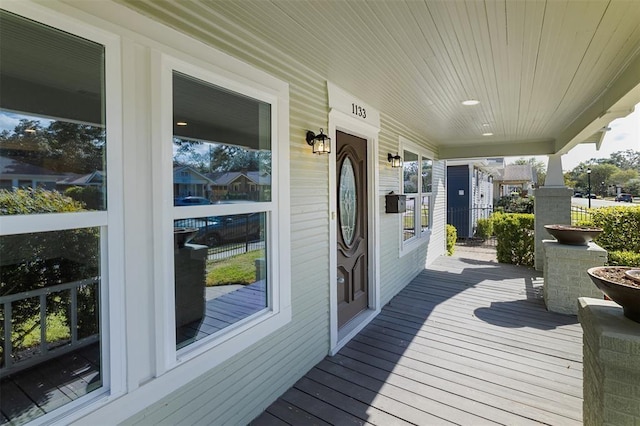 wooden terrace featuring a porch