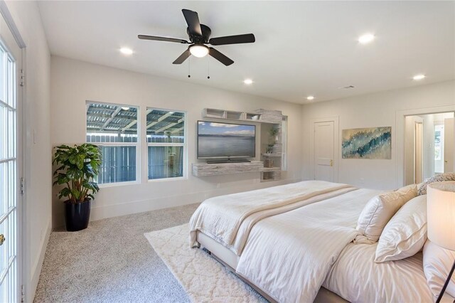 carpeted bedroom with baseboards, a ceiling fan, and recessed lighting