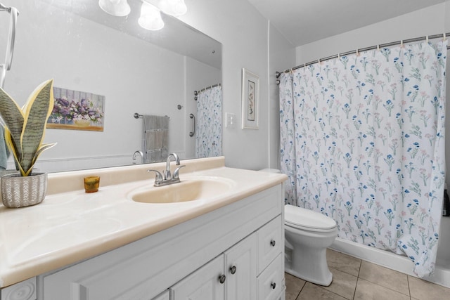 bathroom featuring tile patterned flooring, curtained shower, toilet, and vanity