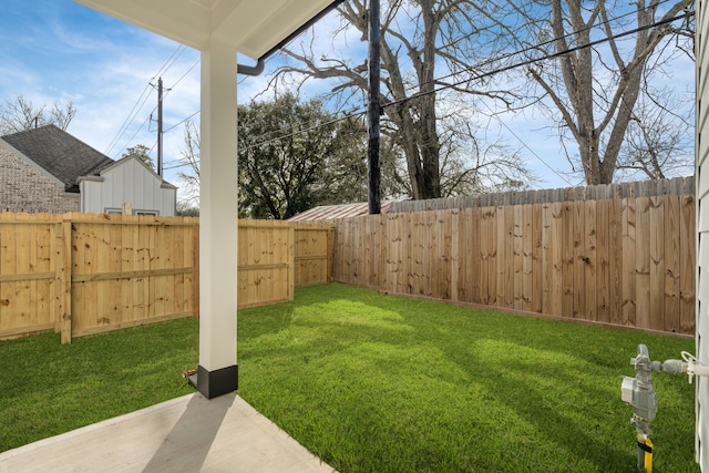 view of yard featuring a fenced backyard and a patio area
