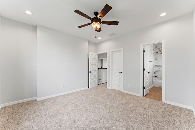 unfurnished bedroom featuring carpet floors, recessed lighting, and baseboards