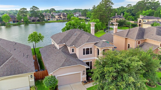6119 Lofty Ln, Spring, TX 77379 - aerial view of residential area featuring a large body of water