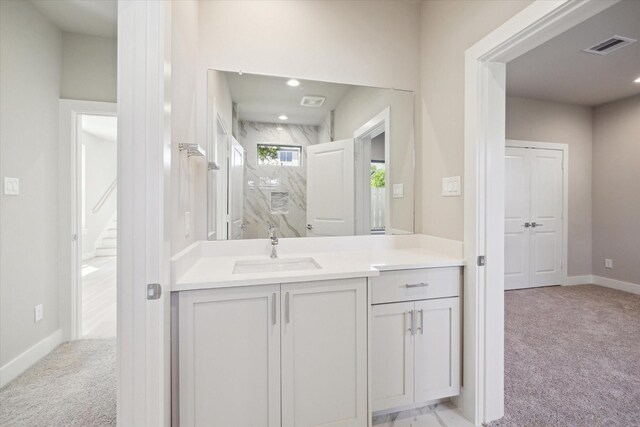 540 Janisch Rd Unit F, Houston, TX 77018 - bathroom featuring visible vents, baseboards, vanity, a marble finish shower, and recessed lighting