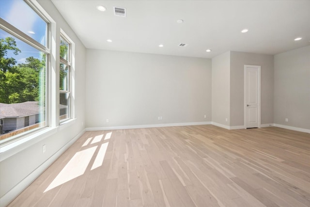 540 Janisch Rd Unit F, Houston, TX 77018 - unfurnished room featuring visible vents, recessed lighting, baseboards, and light wood-type flooring