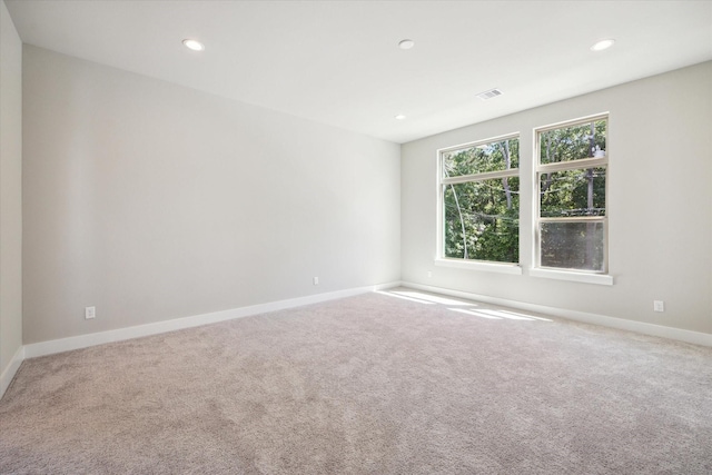 540 Janisch Rd Unit F, Houston, TX 77018 - carpeted empty room featuring recessed lighting, baseboards, and visible vents