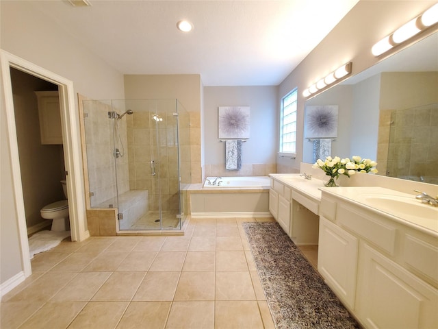 5439 Emerald Pointe Ln, Sugar Land, TX 77479 - full bathroom featuring tile patterned flooring, vanity, a garden tub, toilet, and a shower stall