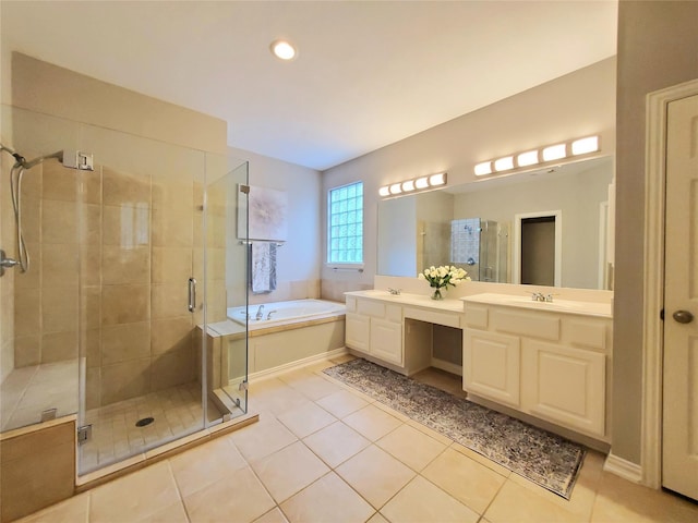 5439 Emerald Pointe Ln, Sugar Land, TX 77479 - bathroom featuring tile patterned flooring, a shower stall, a sink, and a garden tub