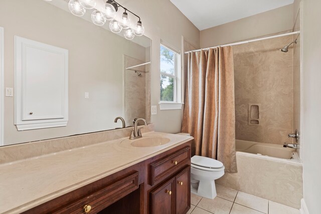 full bath featuring tile patterned floors, shower / bathtub combination with curtain, vanity, and toilet