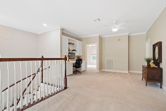 hall featuring baseboards, ornamental molding, light colored carpet, and visible vents