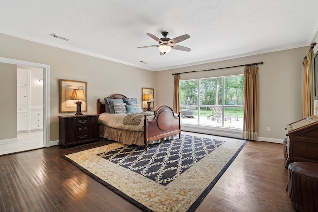 bedroom featuring a ceiling fan, visible vents, crown molding, baseboards, and dark wood-style floors
