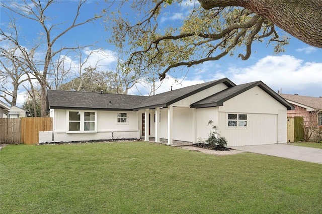 single story home featuring fence, roof with shingles, an attached garage, a front yard, and concrete driveway