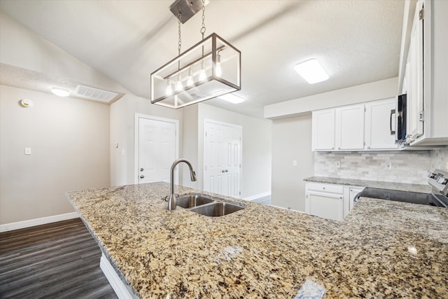 kitchen featuring stainless steel electric range, a sink, baseboards, light stone counters, and dark wood-style floors