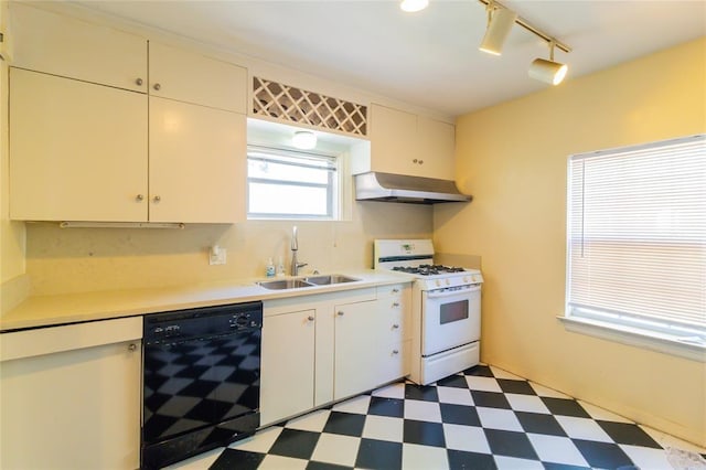 kitchen with exhaust hood, a sink, tile patterned floors, gas range gas stove, and black dishwasher