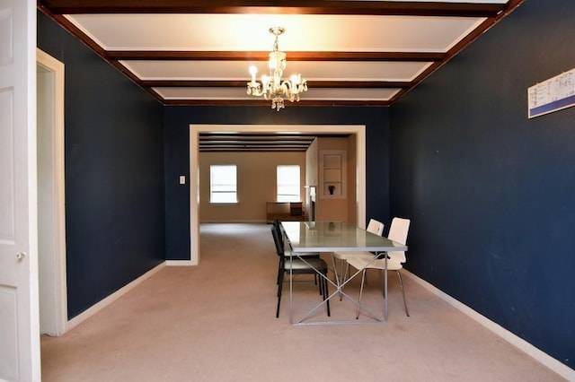 dining area featuring carpet floors, baseboards, beam ceiling, and a chandelier