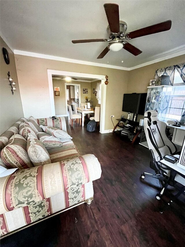 bedroom featuring ceiling fan, baseboards, ornamental molding, and wood finished floors