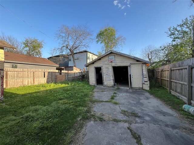 garage with fence
