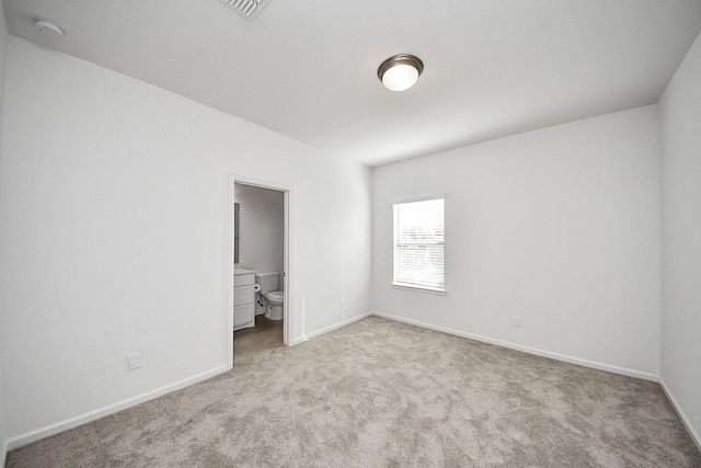 4166 Colony Ln, Missouri City, TX 77459 - unfurnished bedroom featuring light colored carpet, baseboards, and ensuite bathroom